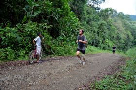 Runners on a the park path along the river in Parque Nacional Chagres, Panama – Best Places In The World To Retire – International Living